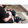 RKD620 REKD Ramp Knee Pads BlackBlue Putting On 2.webp